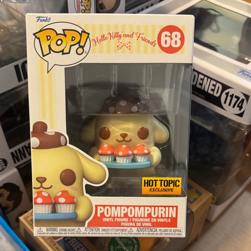 Funko Pompompurin with Brown Hat and Red Cupcakes
